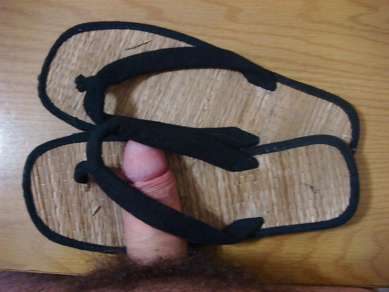 22P Chinelo de dedo preto de esteira