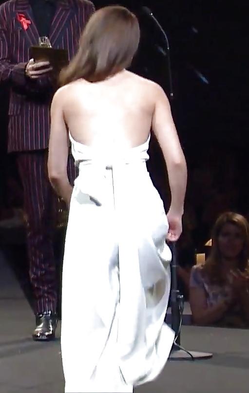 17P Emma Watson - braless cleavage at Fashion Awards, Dec 2014