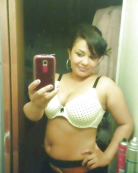 10P A Nerdy Latina Showing Some Titty Wearing Glasses 