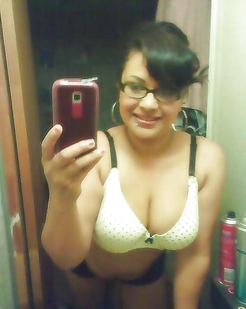 10P A Nerdy Latina Showing Some Titty Wearing Glasses 