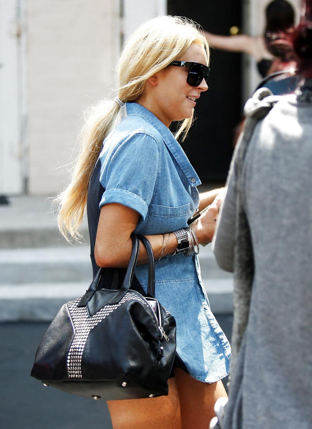 20P Lindsay Lohan showing off major cleavage shirt & shorts