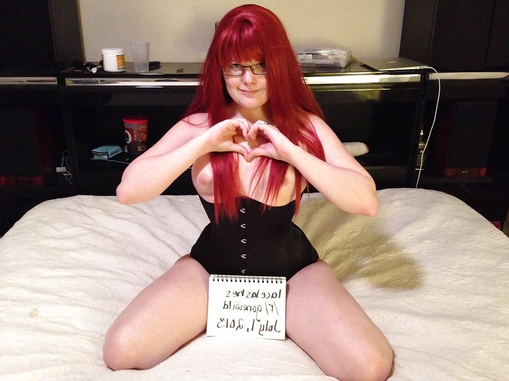 25P Naughty redhead girl