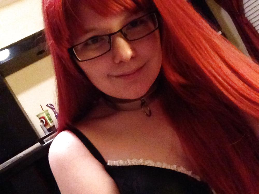 25P Naughty redhead girl