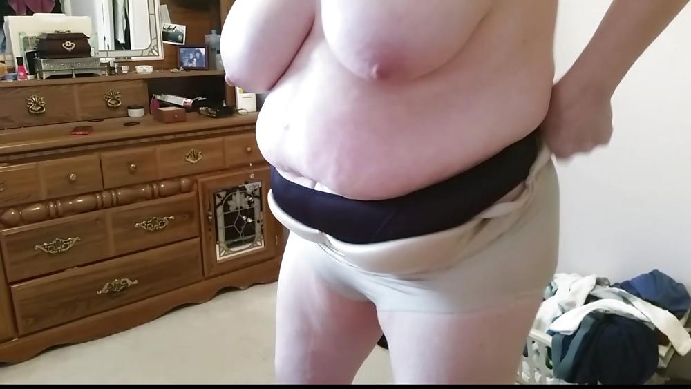 15P Bbw wife half naked, big tits, hard nipples, belly