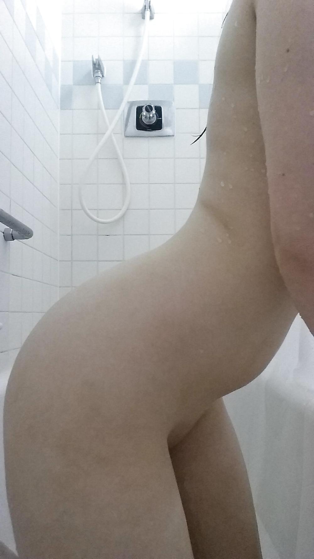 25P In the shower taking selfies.