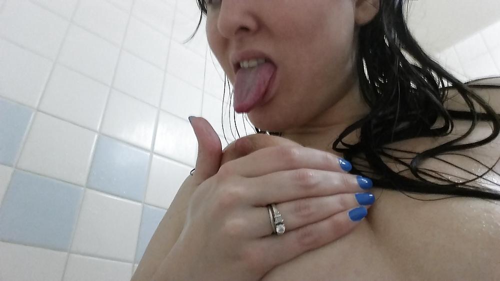 25P In the shower taking selfies.
