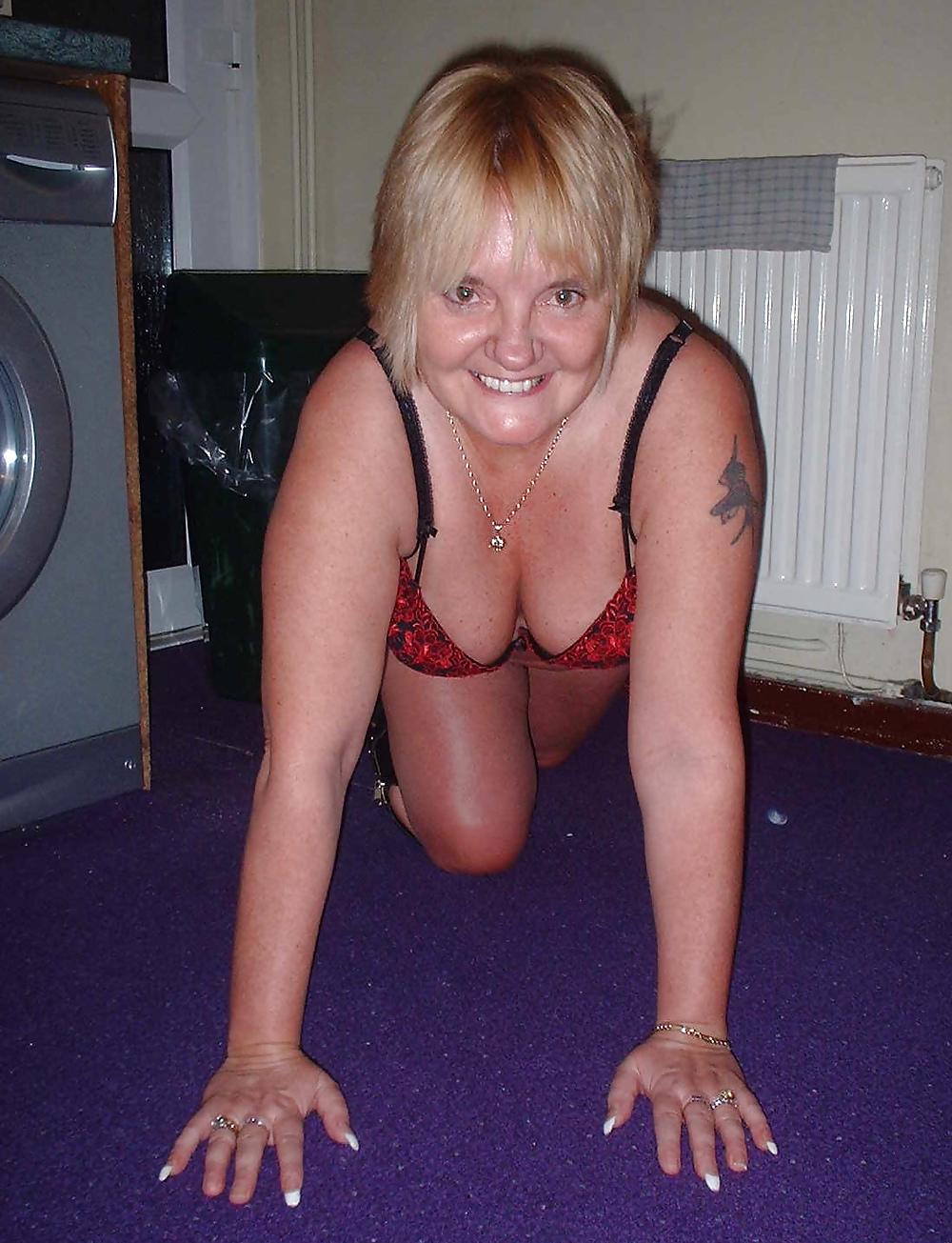 23P Sue getting naked in the kitchen