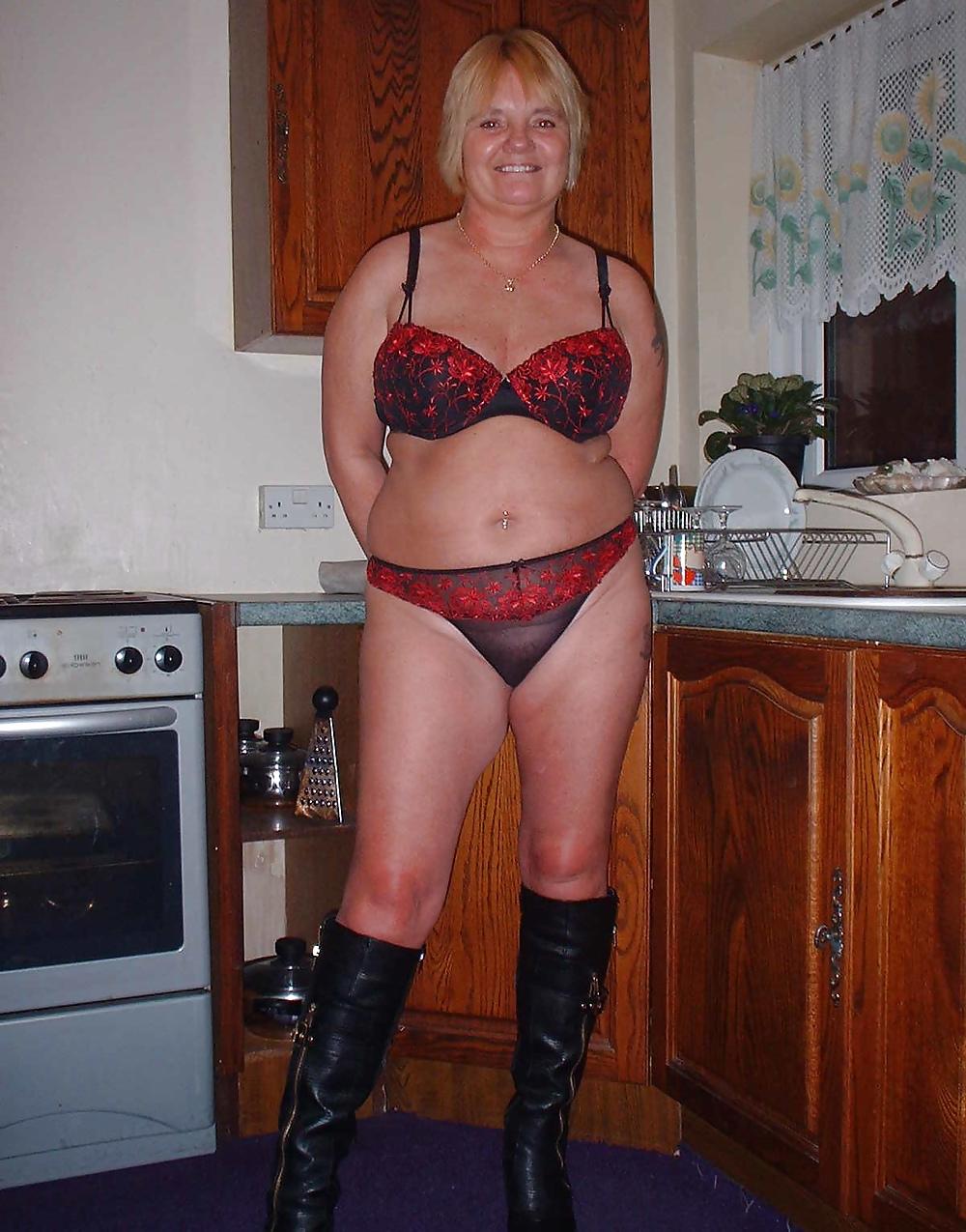 23P Sue getting naked in the kitchen