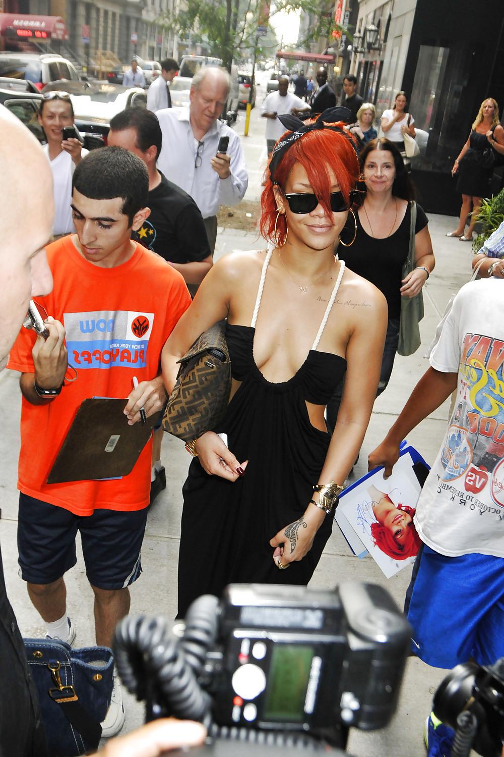 8P Rihanna cleavage leaving her hotel in NY