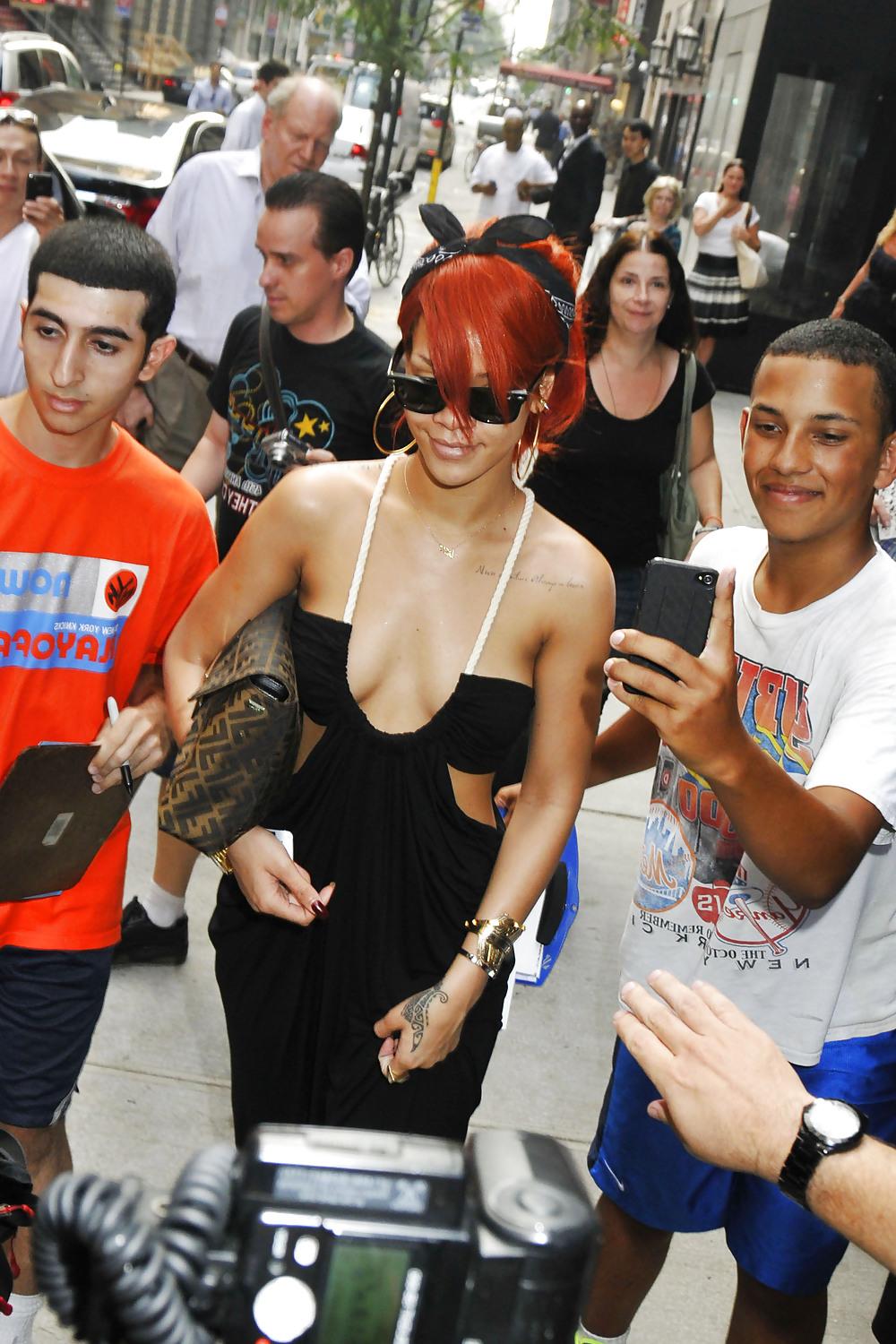 8P Rihanna cleavage leaving her hotel in NY