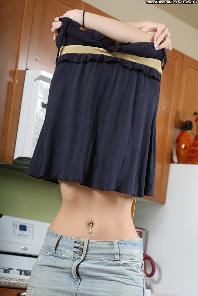 16P Amateur blonde Audrey Nicole gets naked right on the kitchen