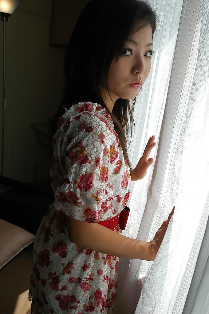 16P Asian teen Nao Miyazaki undressing and exposing her pussy in close up