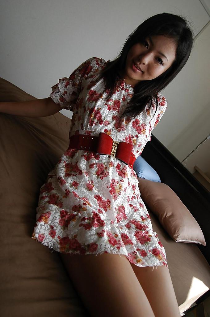 16P Asian teen Nao Miyazaki undressing and exposing her pussy in close up