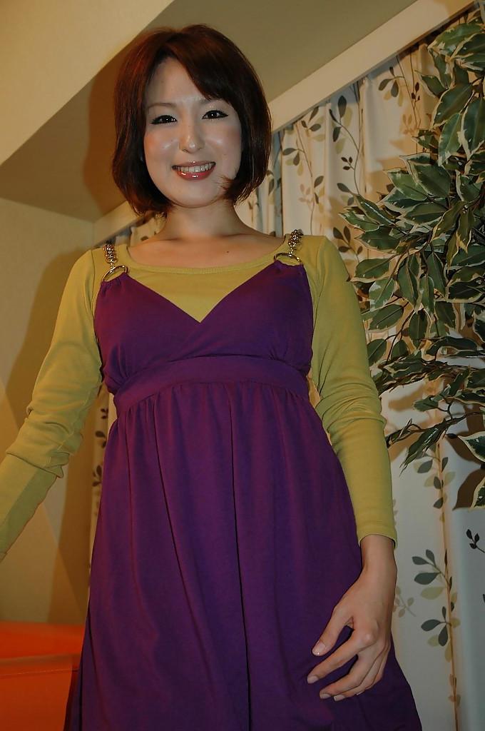 16P Asian teenage sweetie Kazumi Shindou undressing and playing with her toys