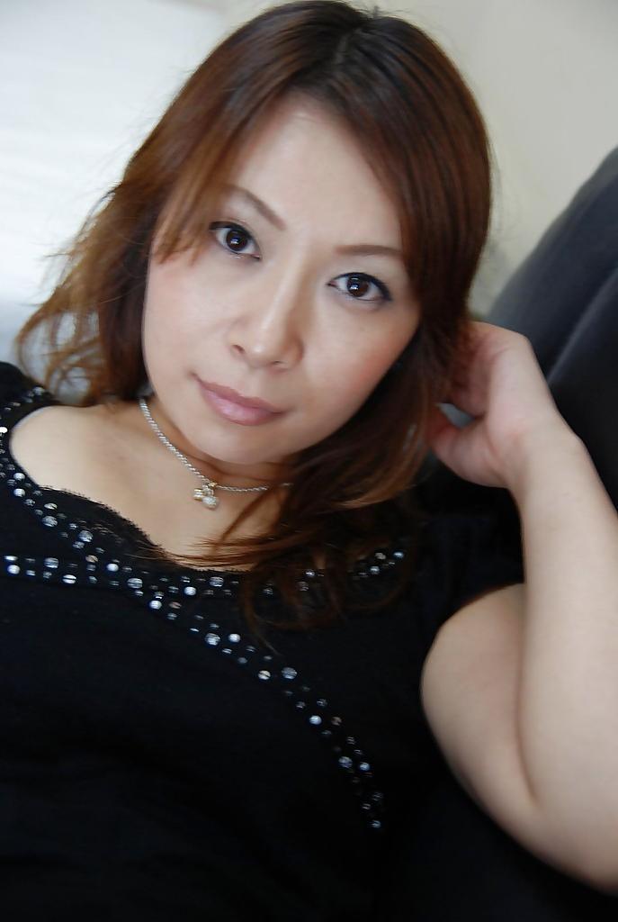 16P Asian MILF Machiko Nishizaki undressing and exposing her inviting cunt