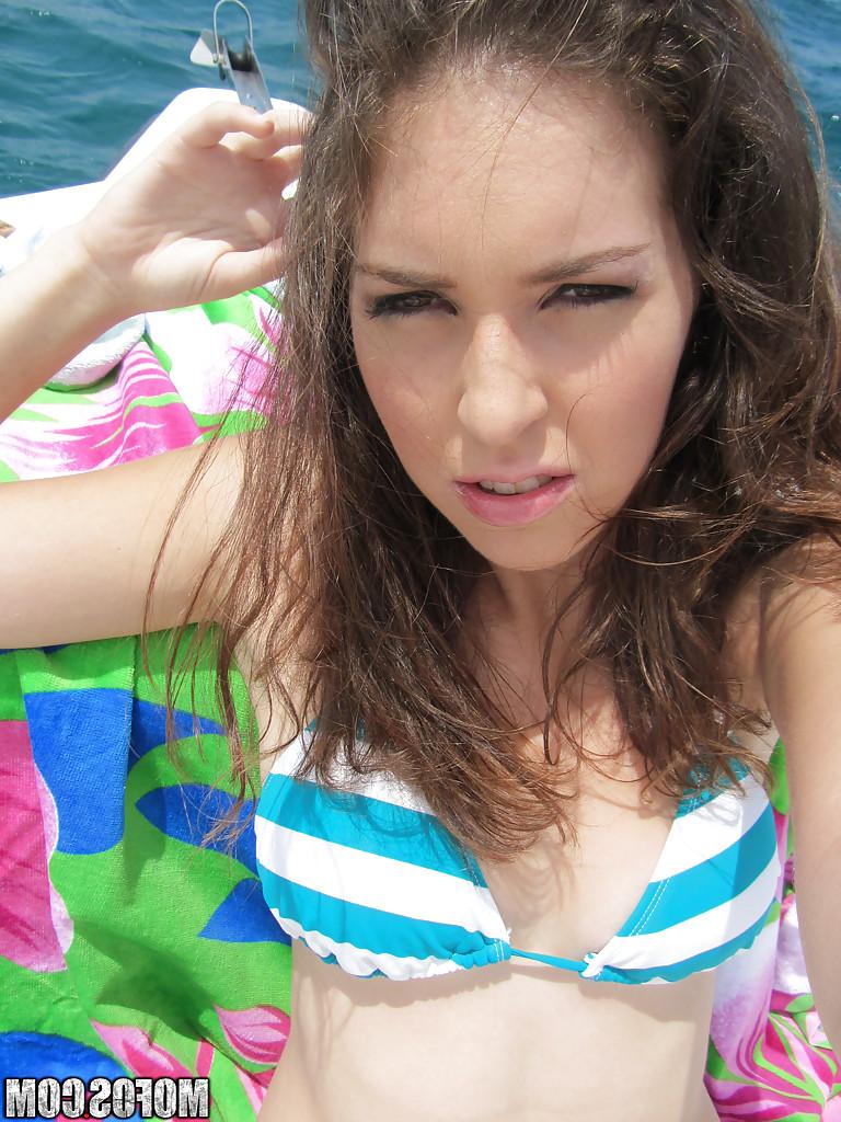 16P Babe Natalia takes some selfies while riding on a yacht in the ocean