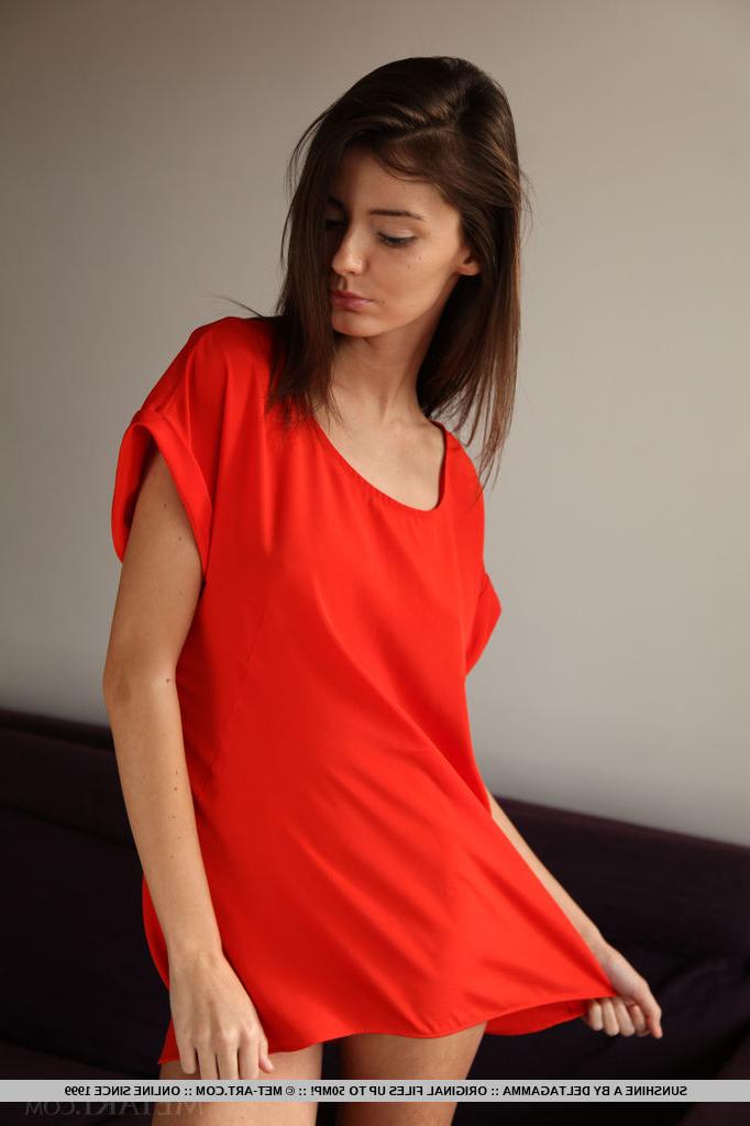 18P Brunette Sunshine A undressing & spreading long legs to vaunt bald pussy