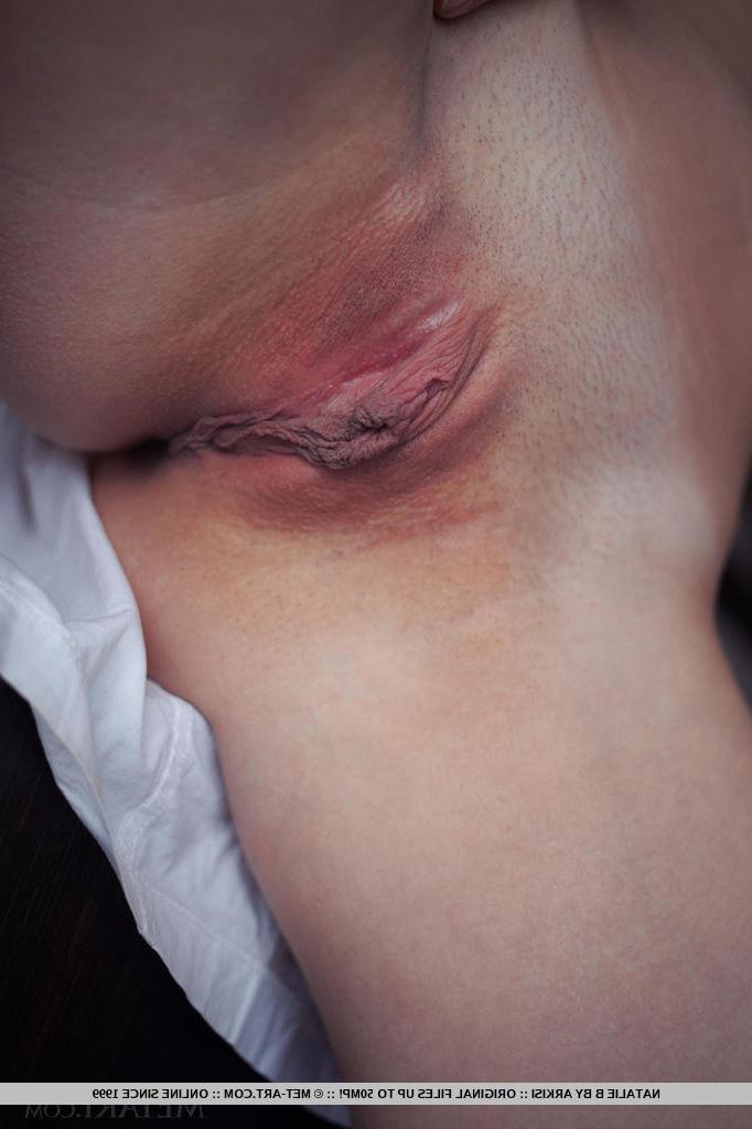 18P Beautiful brunette lassie Natalie B enjoys showing off her bald vagina