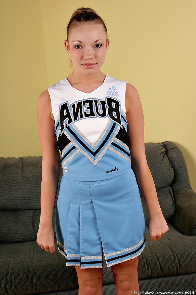 16P Amateur Asian solo girl sheds cheerleader uniform to bare tiny tits
