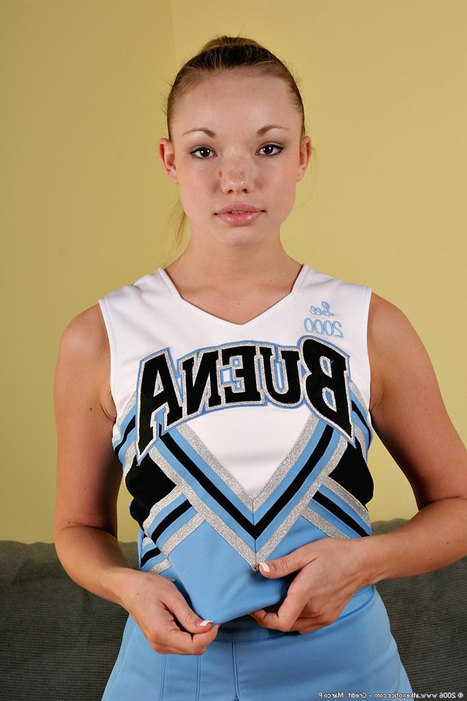 16P Amateur Asian solo girl sheds cheerleader uniform to bare tiny tits