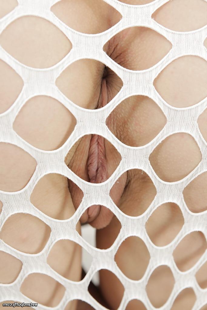 16P Sweet and sexy brunette in fishnet dress self fisting shaved cunt