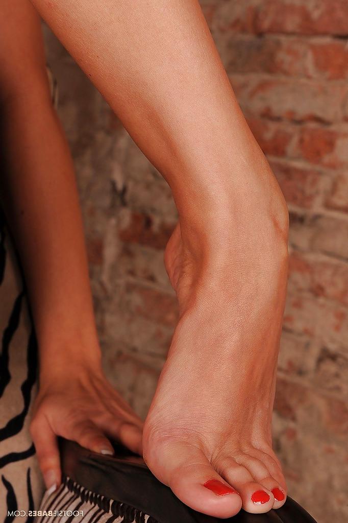 16P Foot fetish babe Cindy Hope uncovering her petite tits and sweet pussy