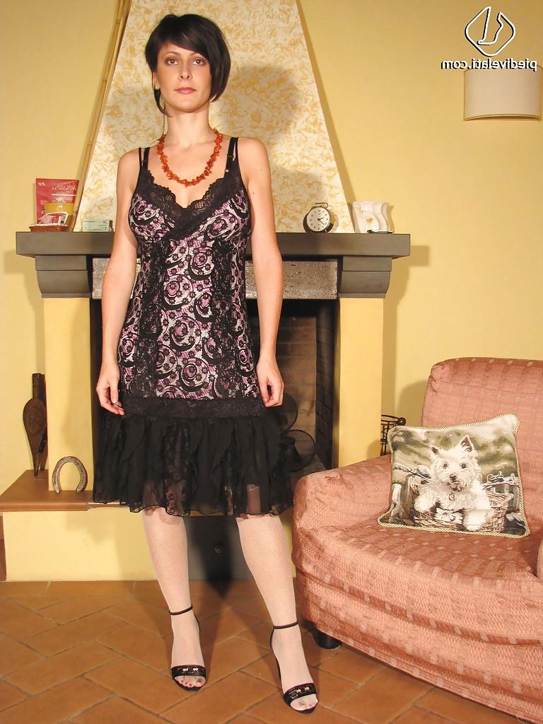 16P Brunette lady in white pantyhose loves to show her feet
