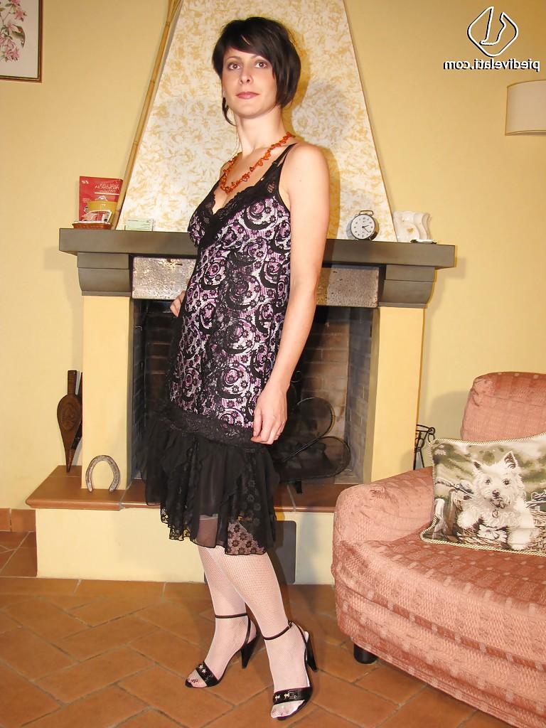 16P Brunette lady in white pantyhose loves to show her feet