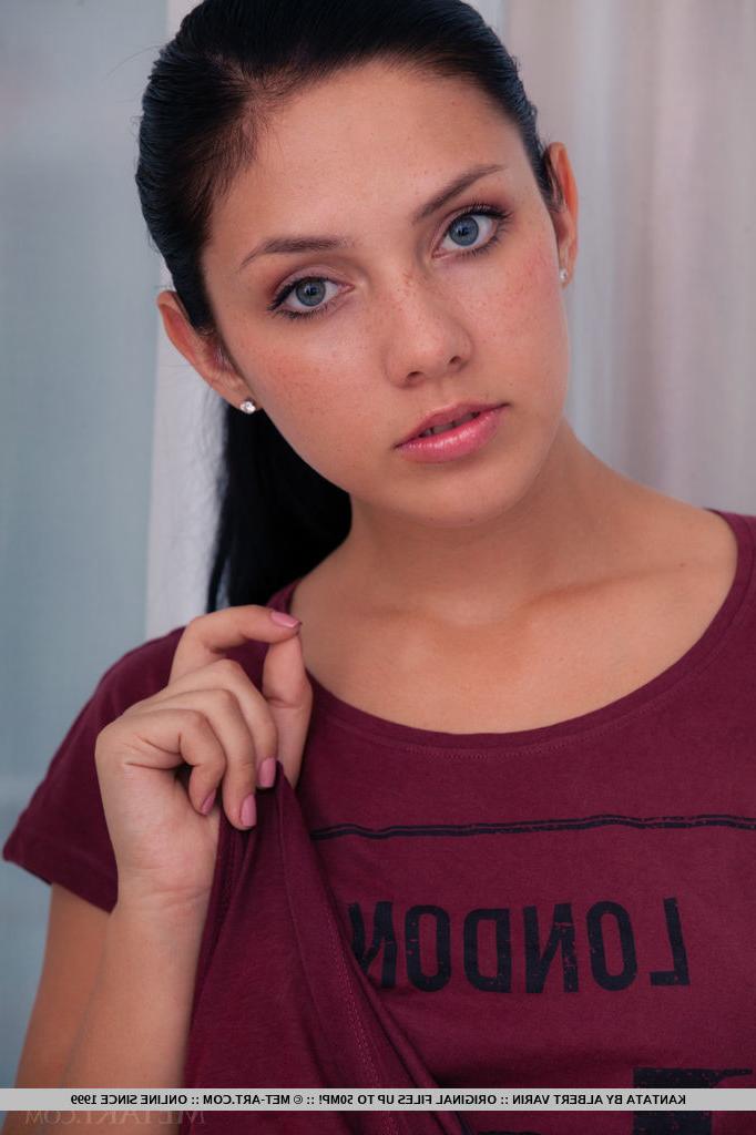 18P Clothed brunette babe revealing small teen tits in denim jeans