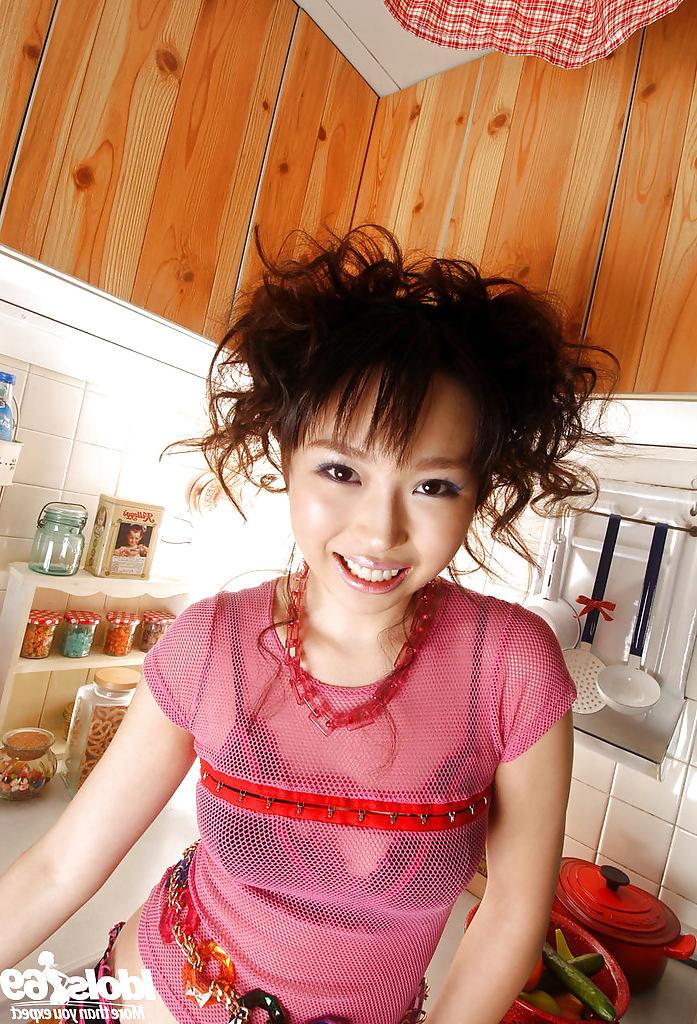 15P Lusty asian babe with sexy legs Aya Shiraishi having fun in the kitchen