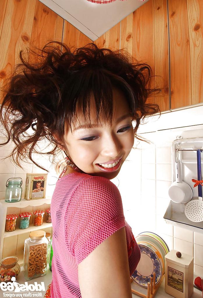 15P Lusty asian babe with sexy legs Aya Shiraishi having fun in the kitchen