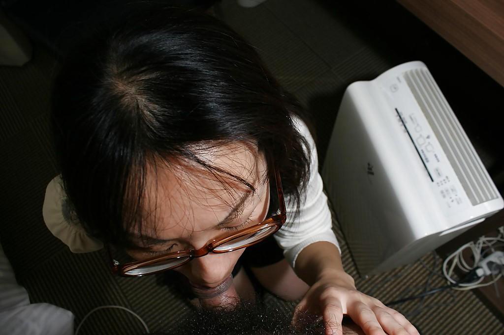 16P Clothed asian MILF in glasses gives head and gets her hairy cunt boned up