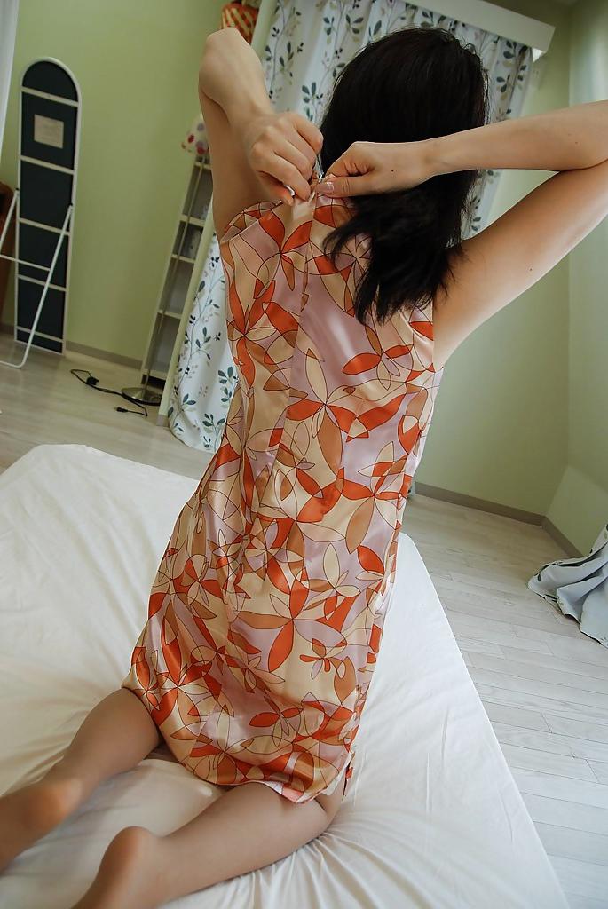 16P Asian MILF Shinobu Yabe undressing and exposing her cunt in close up