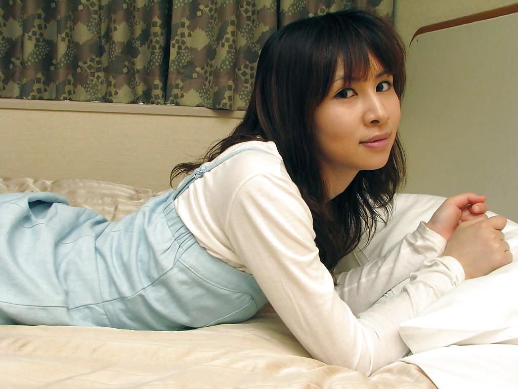 16P asian teen in nylon knee socks undressing and exposing her pussy in close up
