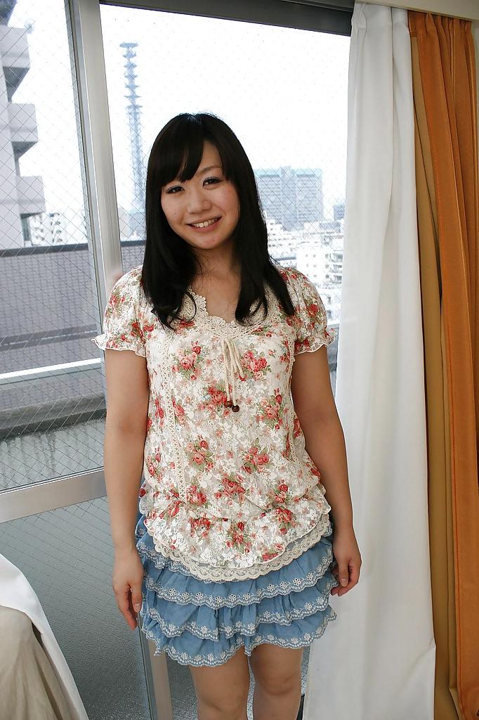 16P Asian teen Waka Moritani undressing and exposing her pussy in close up