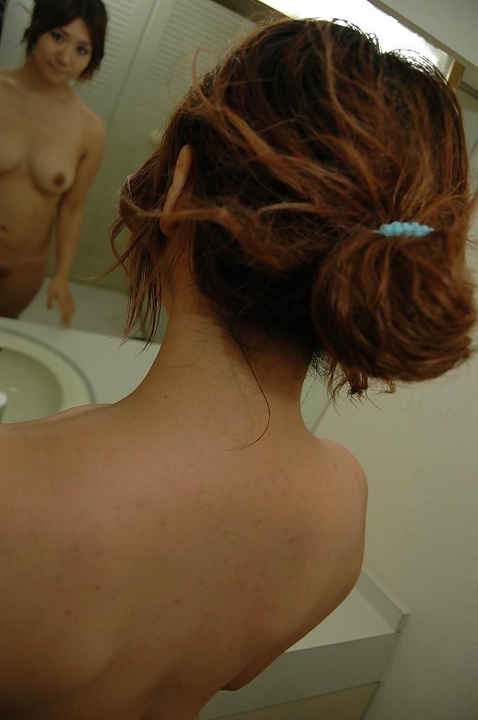 16P Naughty asian MILF undressing and spreading her pussy lips in close up