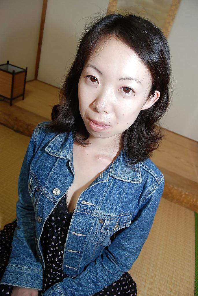 16P Shy asian MILF strips down and has some pussy fingering and vibing fun