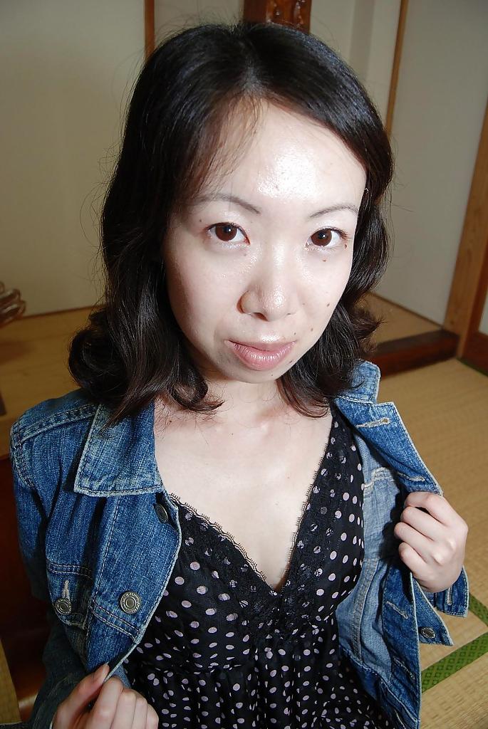 16P Shy asian MILF strips down and has some pussy fingering and vibing fun