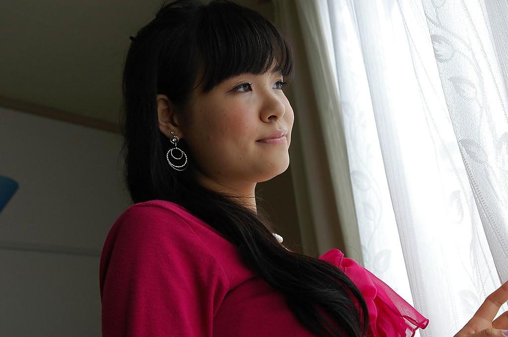 15P Asian teen Nao Kodaka undressing and spreading her pussy lips