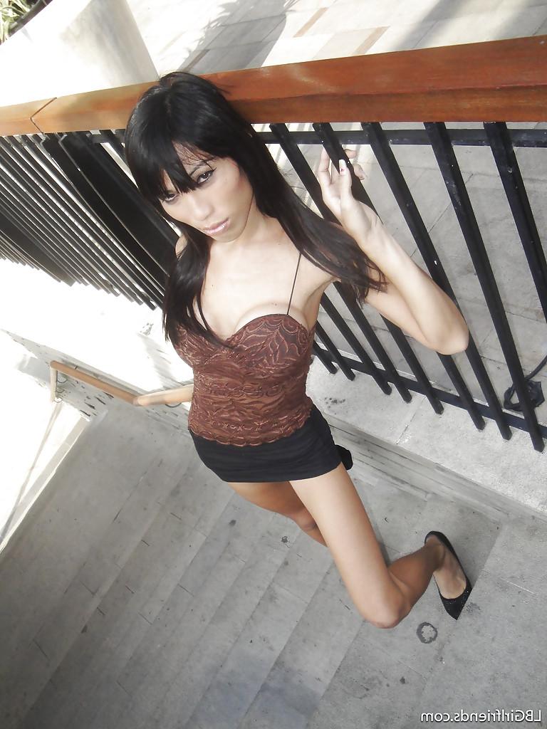16P Big tit Asian tranny Fon posing outdoors and flashing her boobs in public