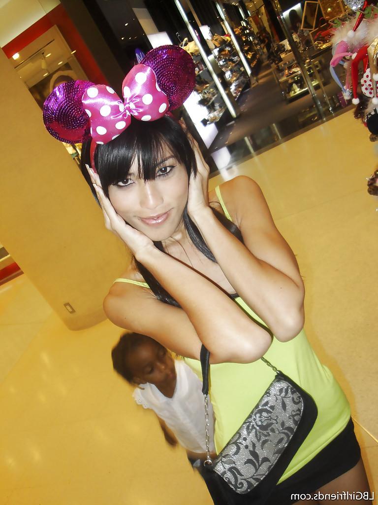 16P Big tit Asian tranny Fon posing outdoors and flashing her boobs in public