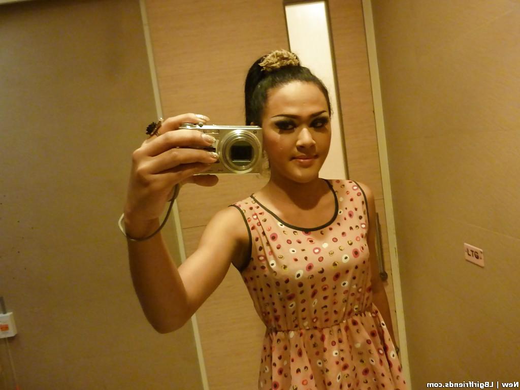 16P Horny Asian tranny New showing off her tight body and panties in public