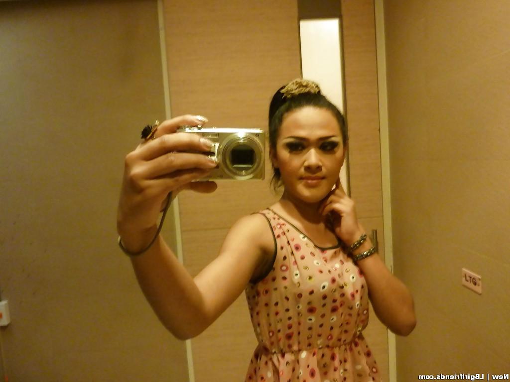 16P Horny Asian tranny New showing off her tight body and panties in public