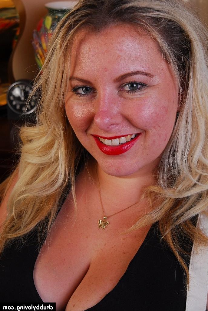16P Big boobed blonde BBW Tawni exposing her stockings and panties