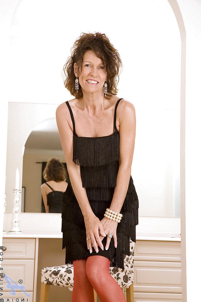 16P Classy mature vixen slowly strips her sexy black dress