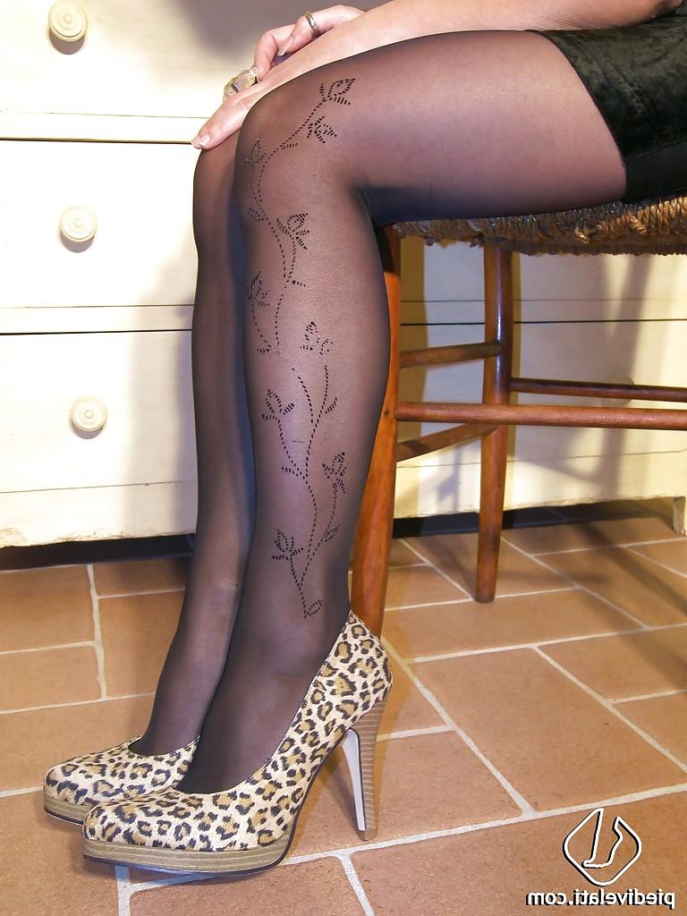 16P Cute brunette girl Francesca loves to show her feet in black pantyhose