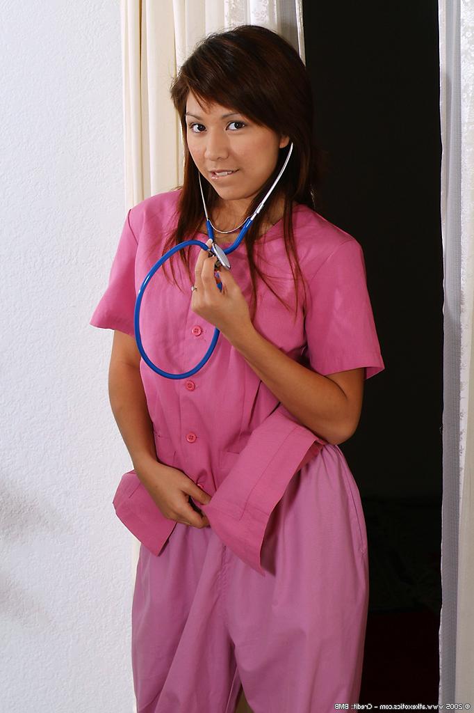 16P Amateur Latina freeing natural tits and smooth slit from nurse uniform