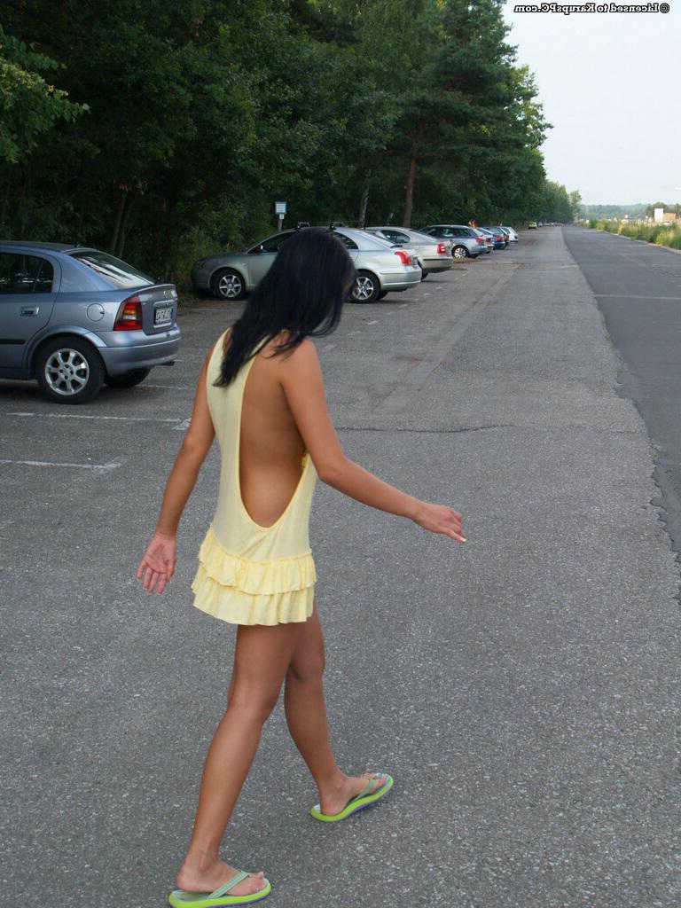 16P Frisky brunette amateur exposing her sexy curves in the public place