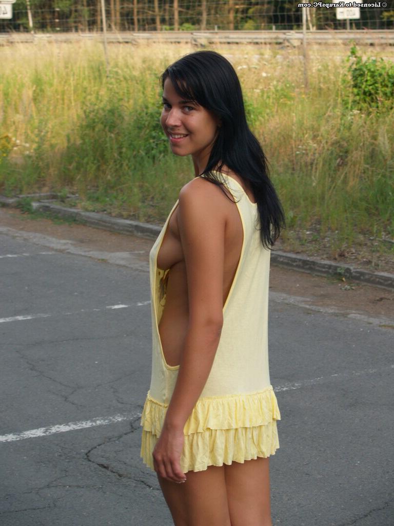 16P Frisky brunette amateur exposing her sexy curves in the public place