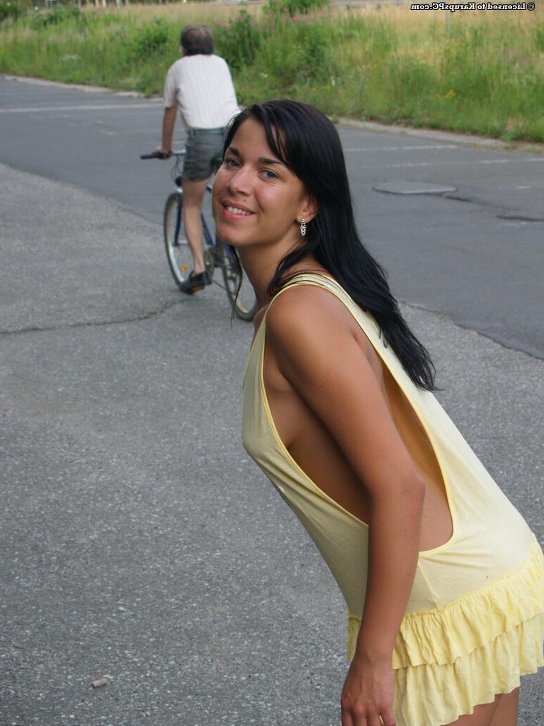 16P Frisky brunette amateur exposing her sexy curves in the public place